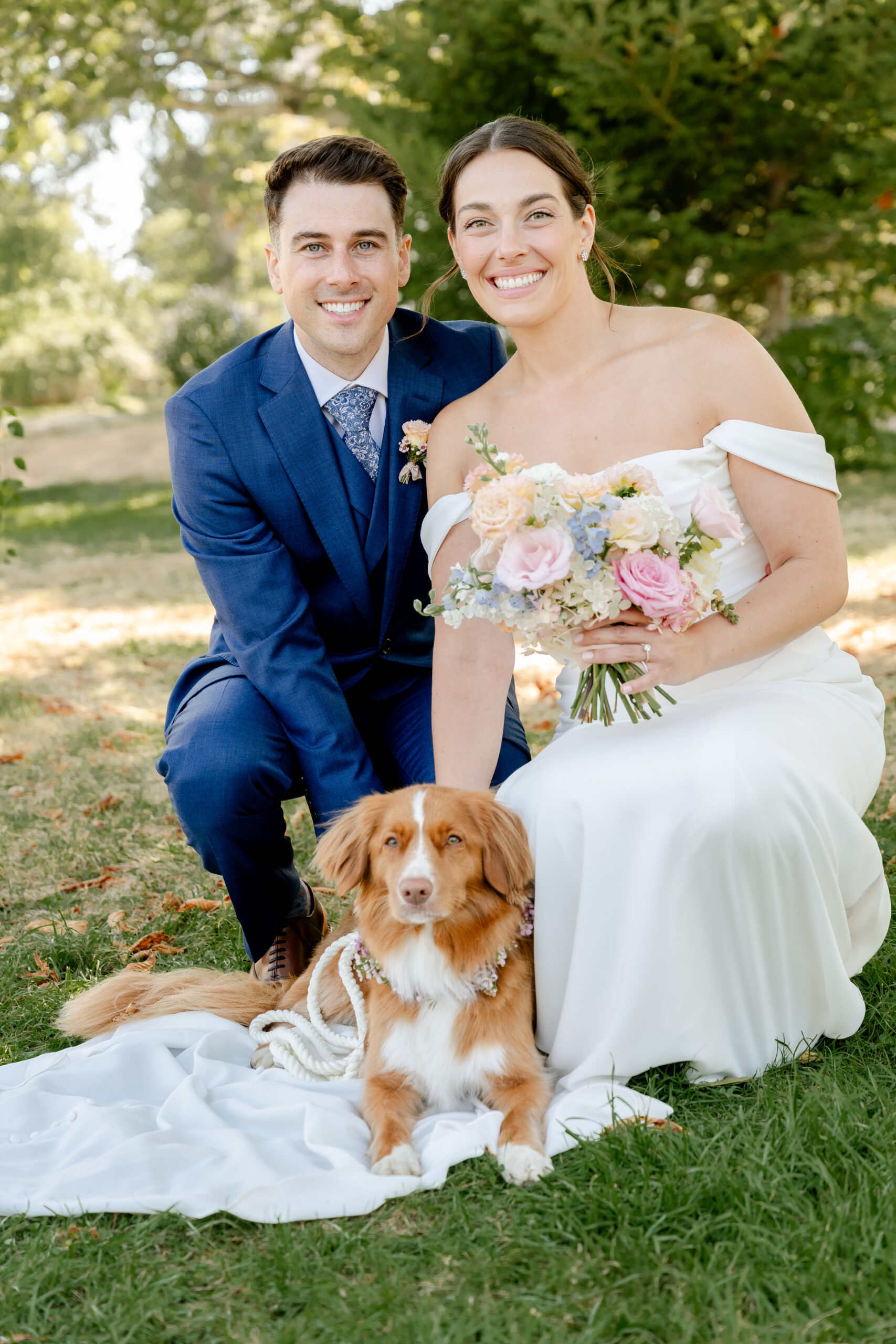 cayenne Couple with dog at wedding.